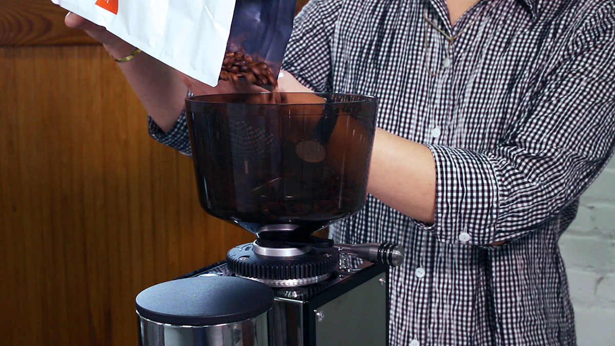 Pouring-coffee-into-hopper.jpg